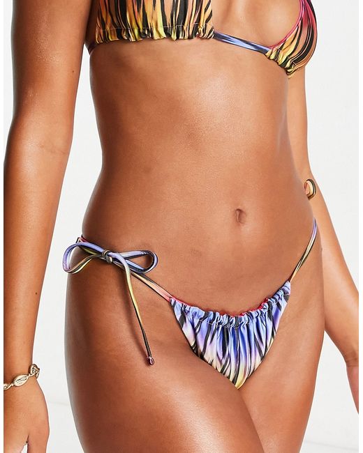 Asos Design reversible tie side bikini bottom in abstract ombre print-