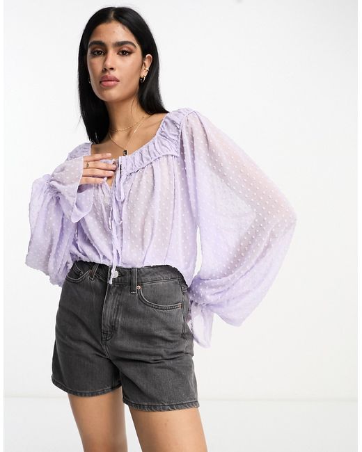 Asos Design textured blouse with volume sleeves tie front in lavender-