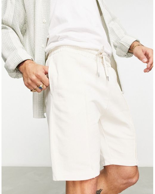 Asos Design smart tapered jersey shorts with pin tuck in