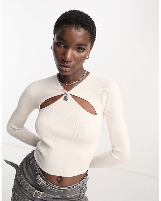 Bershka cut out front ribbed knit top in cream-