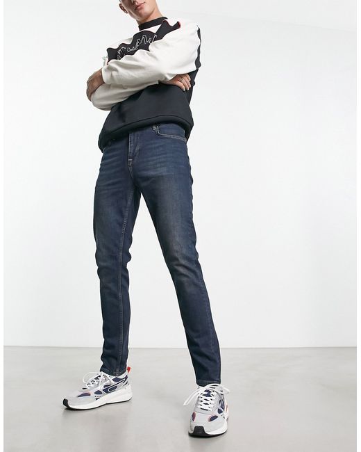 Asos Design skinny jeans in Y2k tinted dark wash