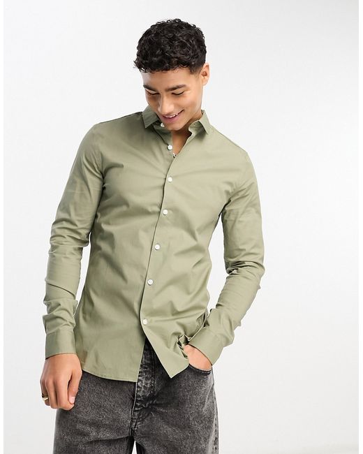 New Look muscle fit poplin shirt in light olive-
