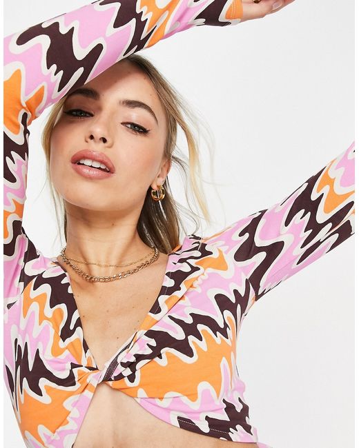 Monki long sleeve cropped top in orange and pink abstract print part of a set-