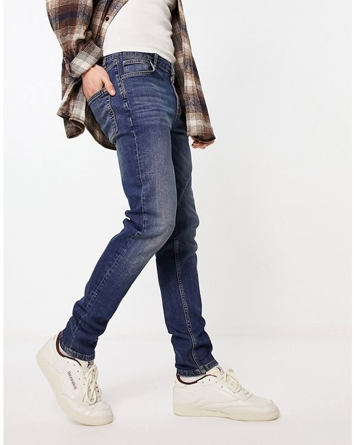 Asos Design skinny jeans in Y2k tinted dark wash