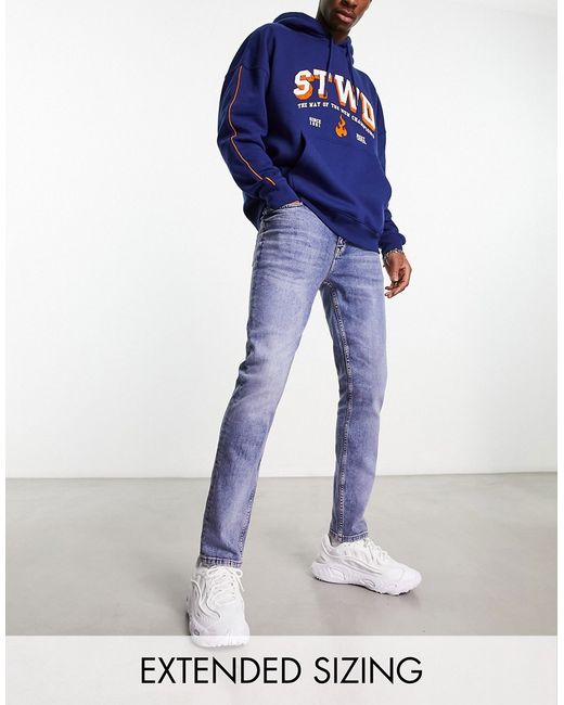 Asos Design skinny jeans in Y2k tinted mid wash