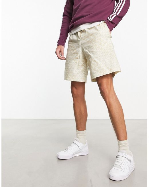 Adidas Originals Monogram all-over print shorts in