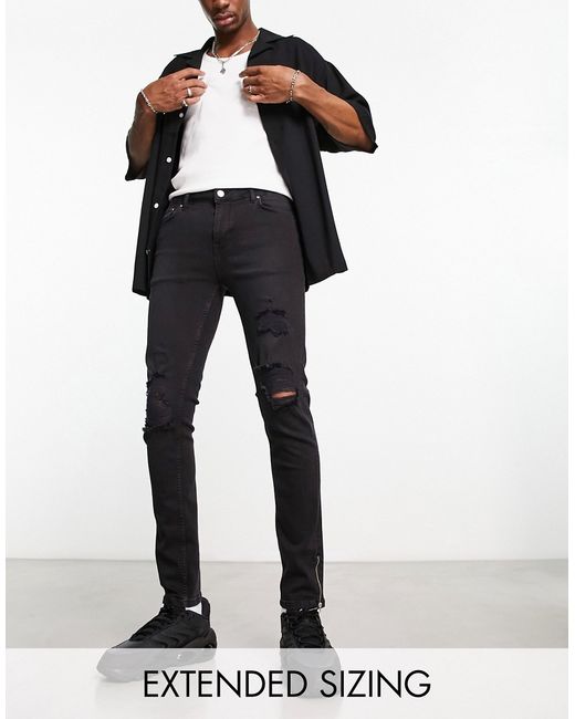 Asos Design skinny jeans in with knee rips and zip detail