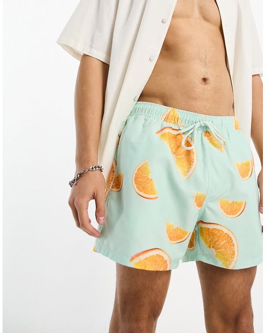 Asos Design swim shorts in short length orange print-