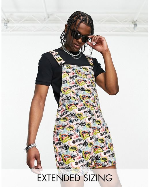 Asos Design overalls in short length with all over eyes print-