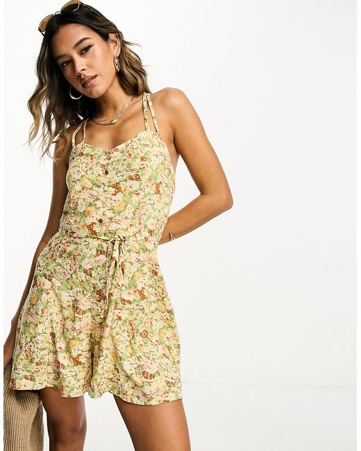 River Island floral strappy belted romper in cream-