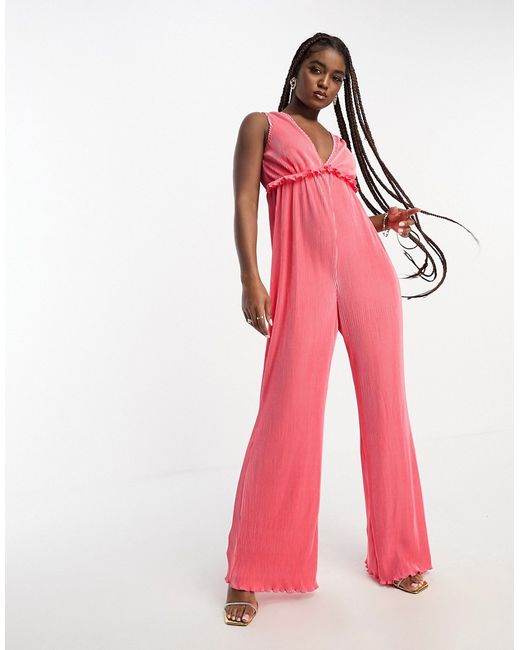 The Frolic plisse frill detail plunge front jumpsuit in coral-
