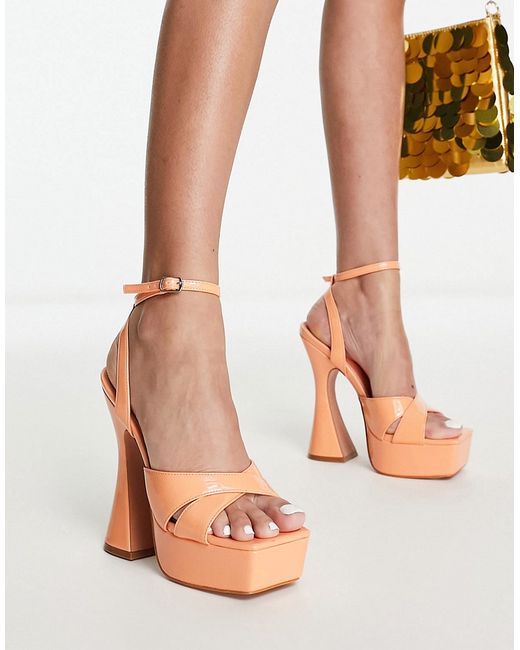 SIMMI Shoes Simmi London Oceani platforms with flared heel in apricot patent-