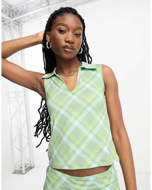Weekday Phoebe sleeveless polo top in and blue check pattern part of a set