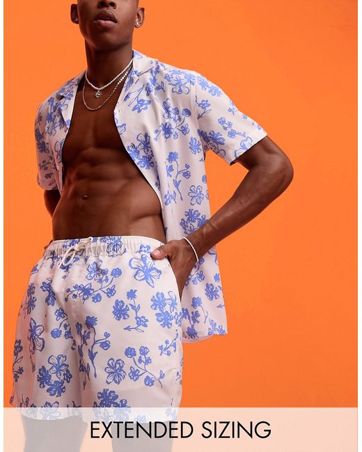 Asos Design swim shorts in short length floral print part of a set-