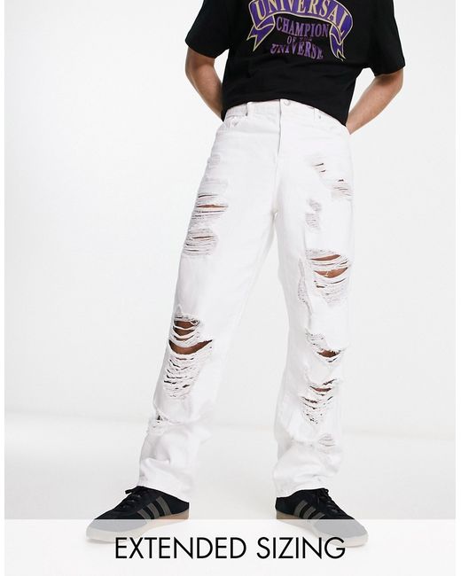 Asos Design baggy jeans with heavy rips in