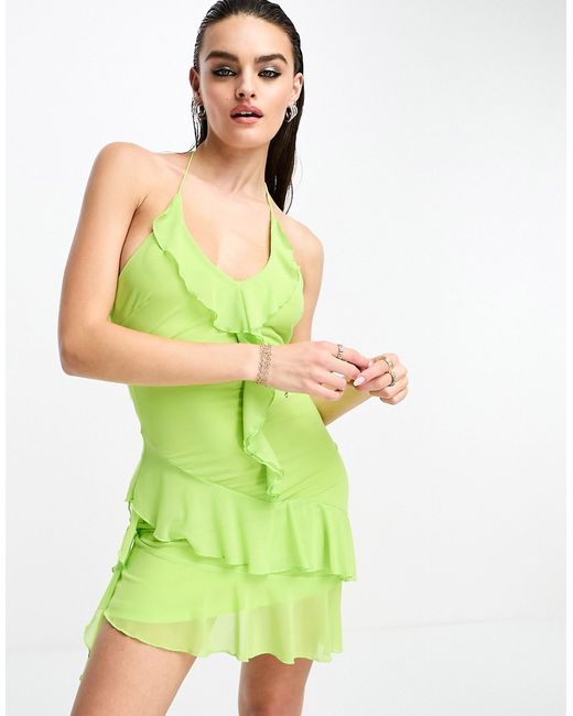 Glamorous halter neck mesh mini dress with asymmetric hem detail in lime-