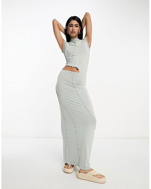 Asos Design capped sleeve maxi dress with cut out waist and seam detail in sage-