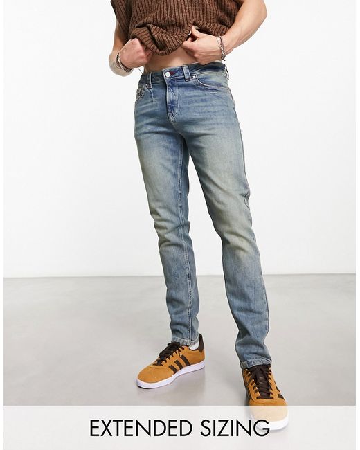 Asos Design skinny jeans with stitch detail in y2k light wash