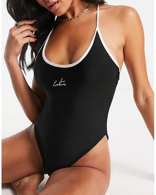 The Couture Club cross back logo swimsuit in