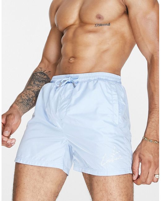 The Couture Club logo swim shorts in pale