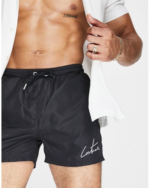 The Couture Club logo swim shorts in