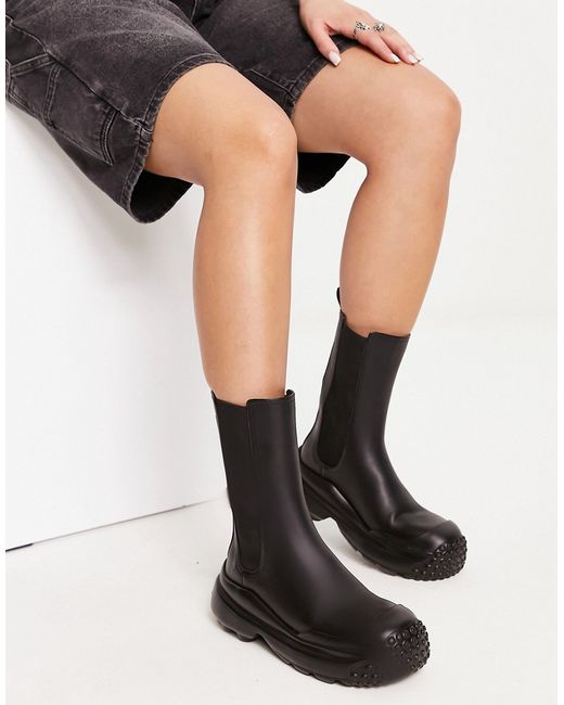 Charles & Keith rubber calf boots in