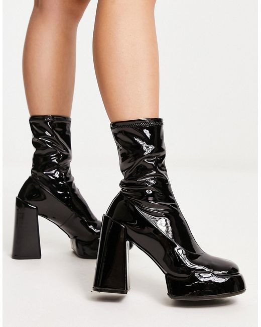 Charles & Keith heeled ankle boots in patent
