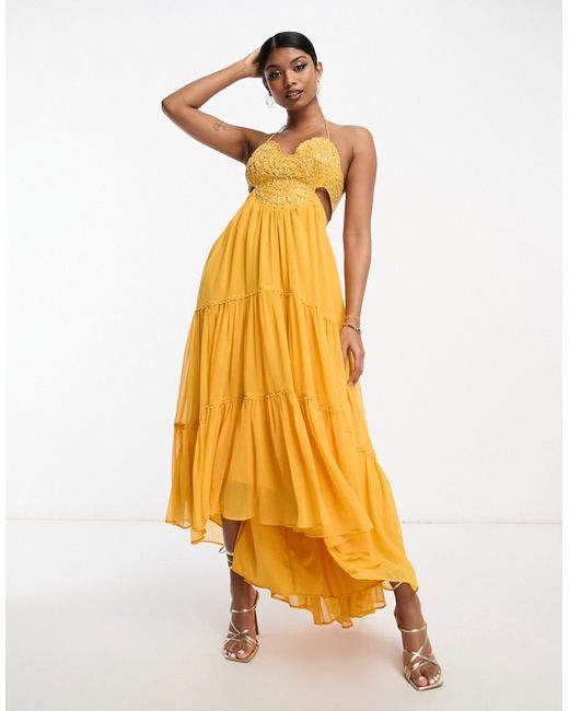 Asos Design embellished bodice tiered maxi dress with hi low hem and open back in mustard-