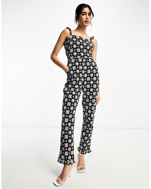 Never Fully Dressed broderie jumpsuit in monochrome print-