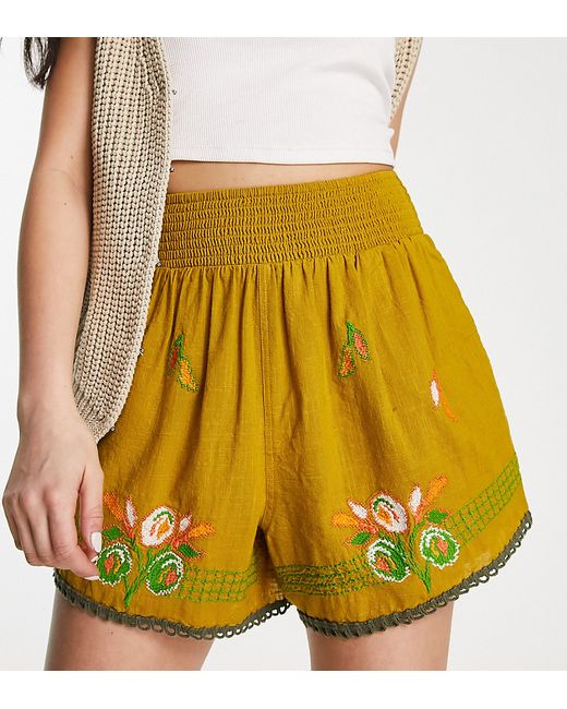 Reclaimed Vintage embroidered shorts in washed
