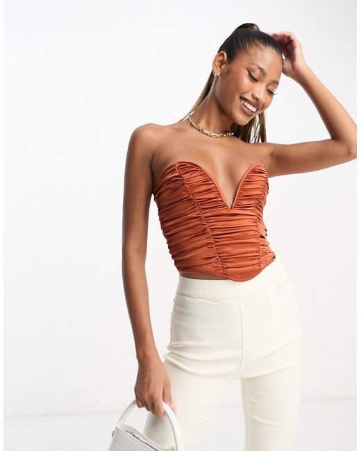 Asos Design strapless ruched corset top with plunge v in rust-