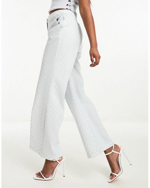 Twisted Tailor lace suit flare pants in