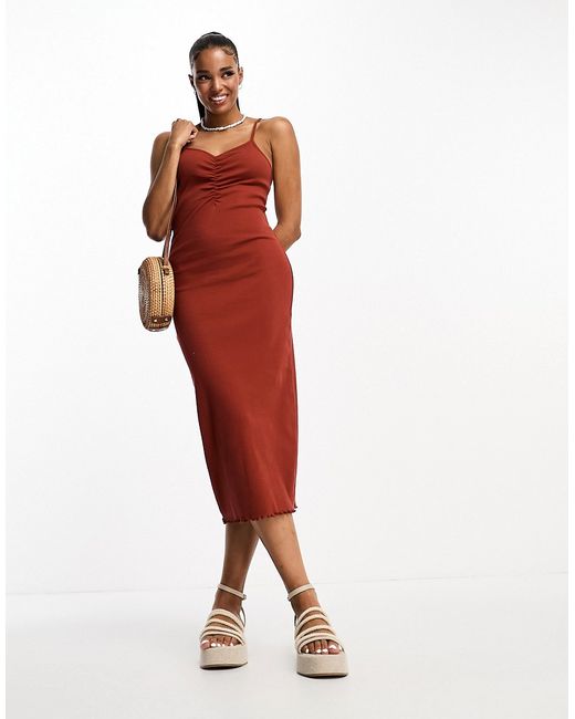 Pieces exclusive ruched front cami midi dress in rust-