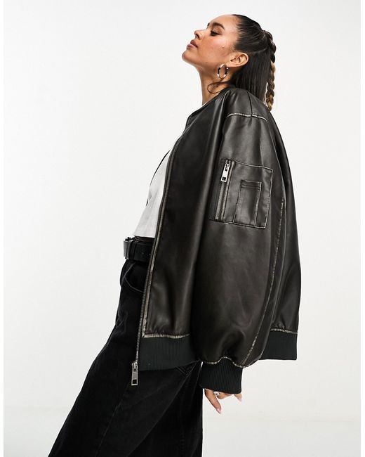 Asos Design washed faux leather bomber jacket in