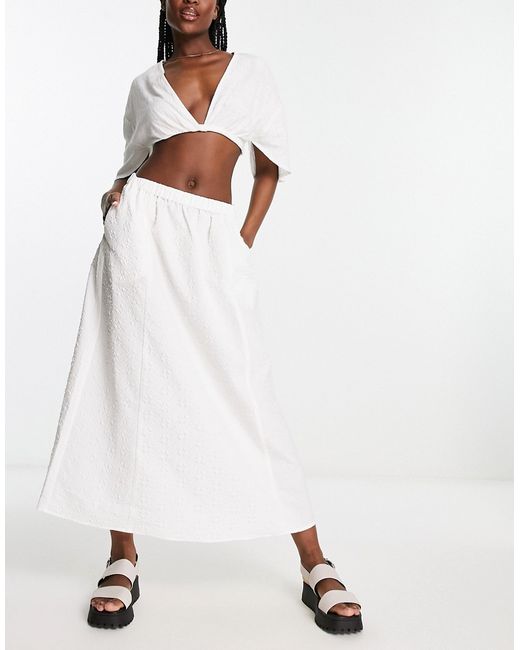Monki solid jacquard flower midi skirt in white-