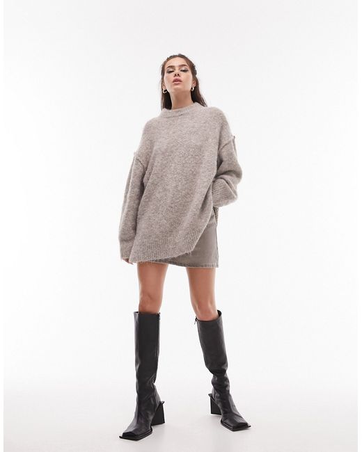 TopShop knitted longline exposed seam fluffy crew neck sweater in oat-