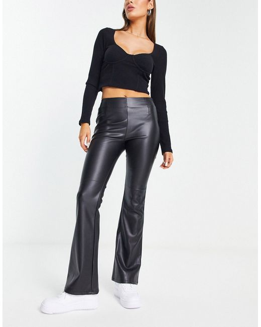 Asos Design stretch faux leather flare pants in
