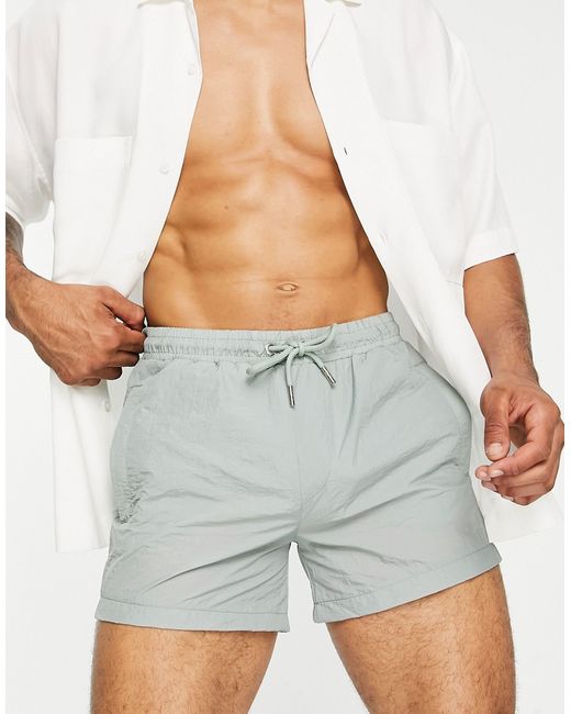 The Couture Club essentials swim shorts in sage with crinkle finish