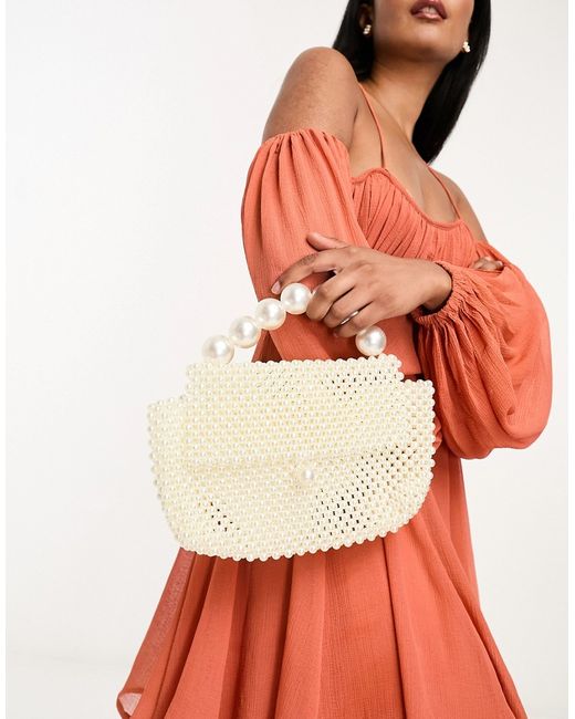 True Decadence pearl structured clutch bag-