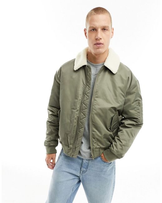 Asos Design oversized bomber jacket in khaki with borg collar ecru-