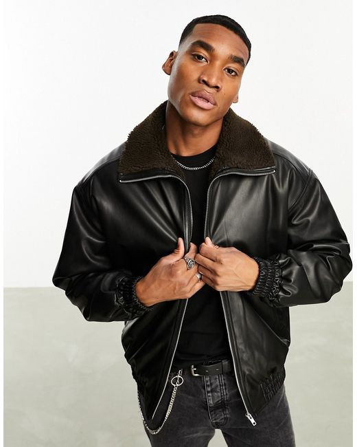 Asos Design oversized faux leather bomber jacket in brown with borg lining-