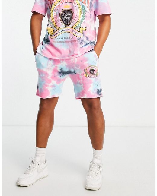 SikSilk jersey shorts in pink tie dye with varsity print part of a set-
