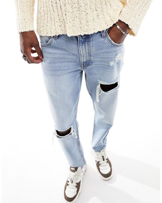 Asos Design classic rigid jeans with rips in light wash