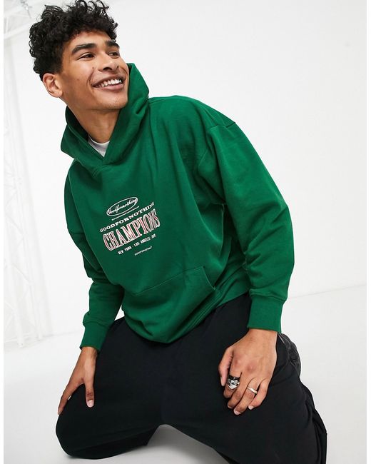 Good For Nothing oversized pullover hoodie with champions print