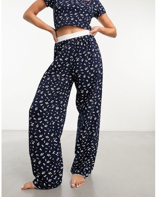 Asos Design mix match ditsy print pajama pants with exposed waistband and picot trim