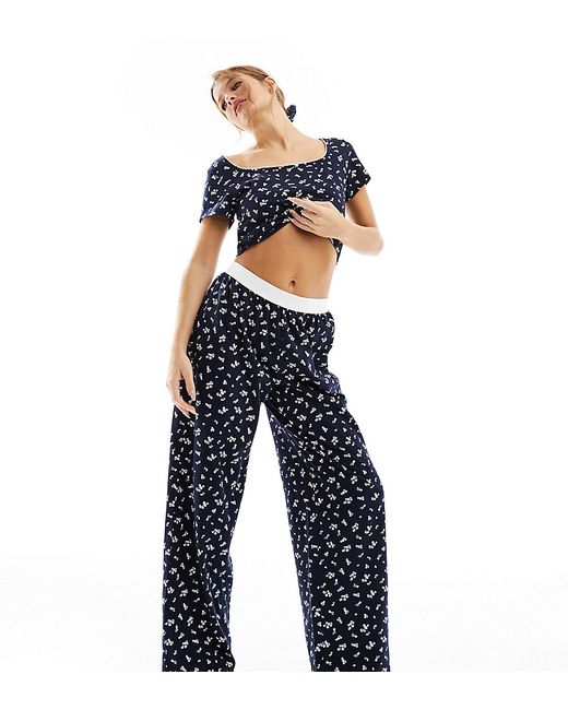 Asos Design Petite mix match ditsy print pajama pants with exposed waistband and picot trim