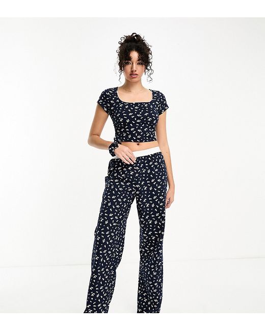 Asos Design Tall mix match ditsy print pajama pants with exposed waistband and picot trim