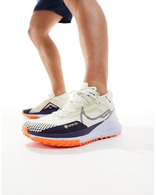 Nike Running Nike Pegasus Trail 4 sneakers cream and orange-