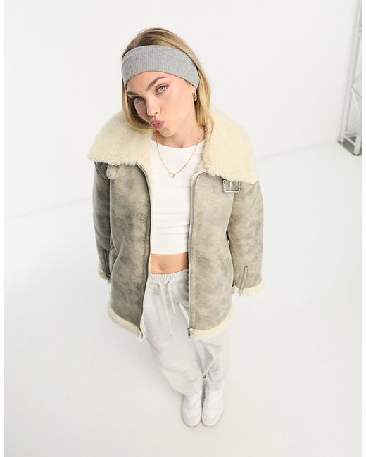 Monki distressed faux leather and shearing aviator jacket-
