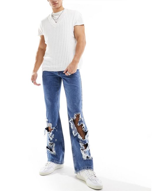 Asos Design vintage flare jeans with heavy rips